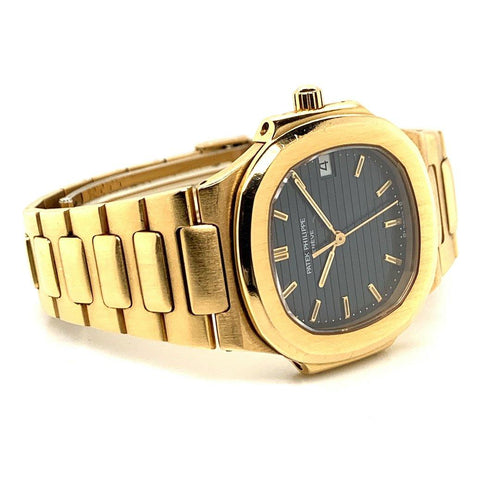 Shop Patek Philippe Nautilus 18K Yellow Gold Black Dial Ref. 3900/1J